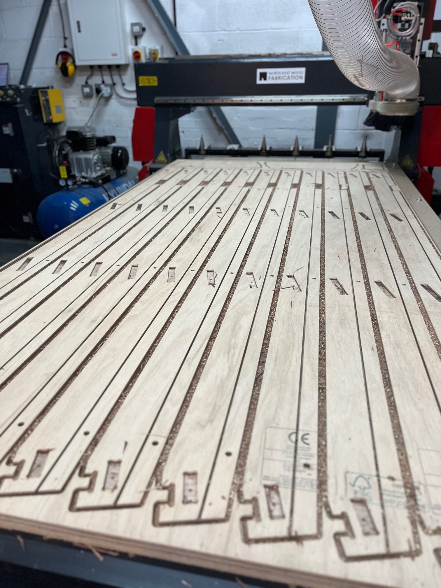 CNC router cutting plywood