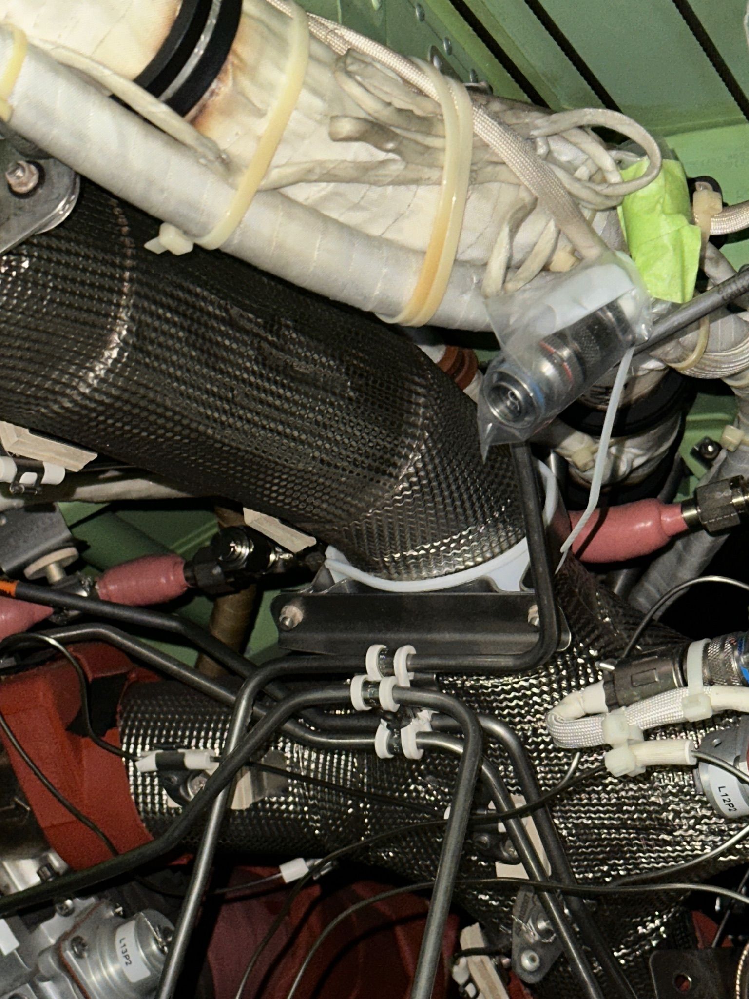 A large passenger jet is parked on the tarmac at an airport.