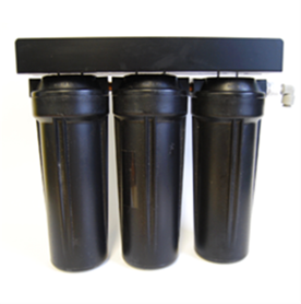 Three black containers are sitting on a white surface