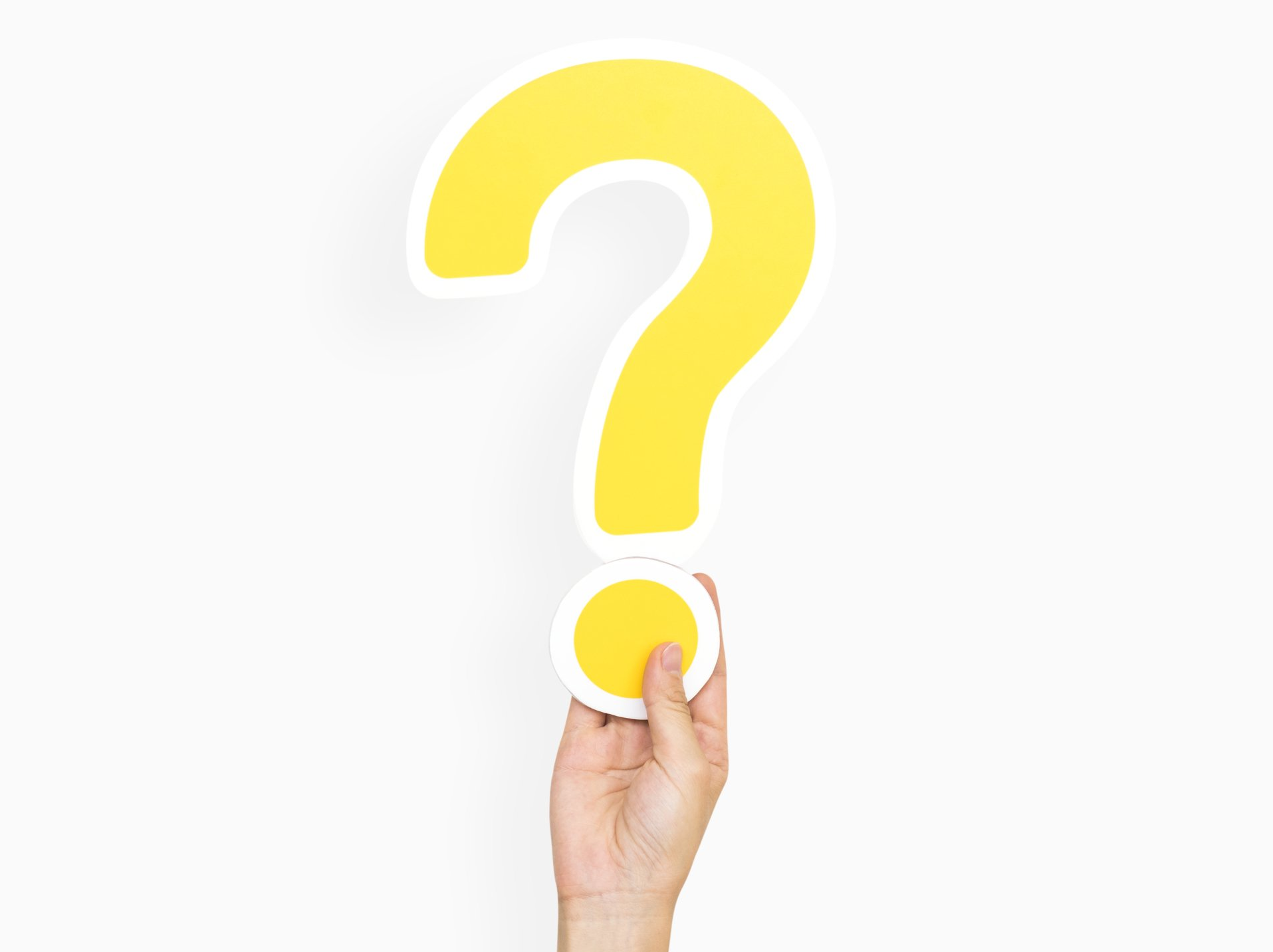 A hand is holding a yellow question mark on a white background.