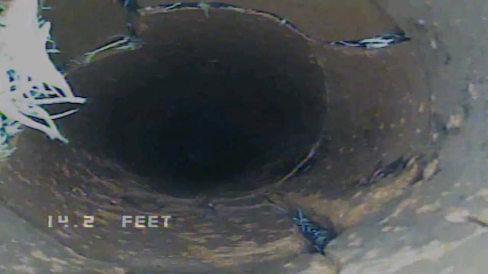 A close up of a hole in a pipe with a hole in the middle.