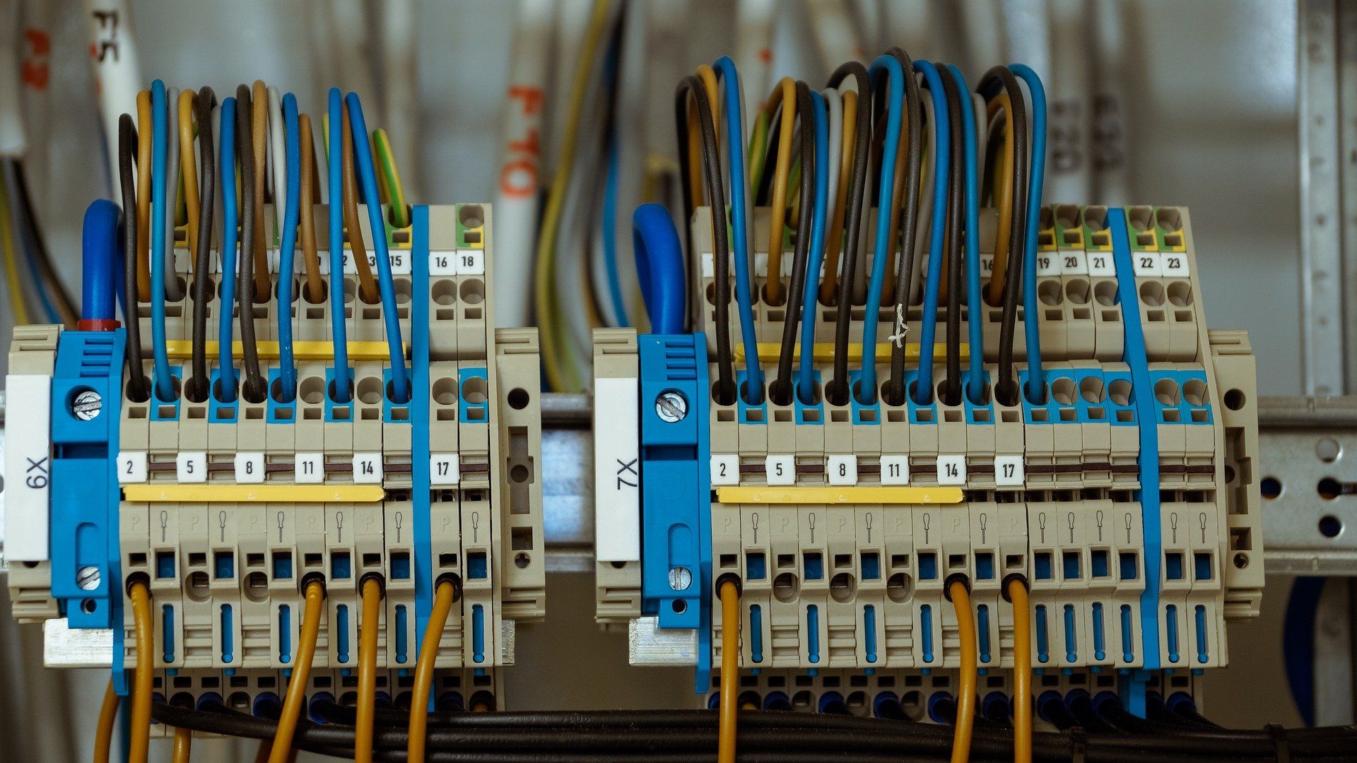 A bunch of wires are connected to a electrical box.