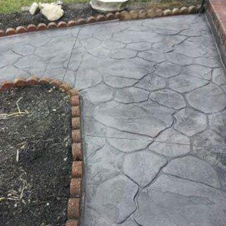 Stamped concrete path in garden - Masonry work in Claymont, DE