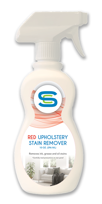 A spray bottle of red upholstery stain remover on a white background.