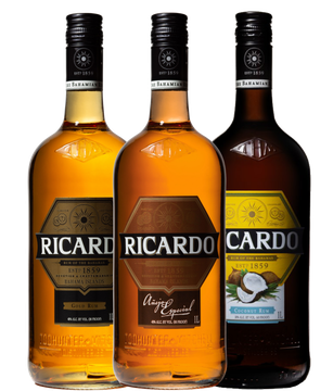 Three bottles of ricardo cardo are lined up next to each other