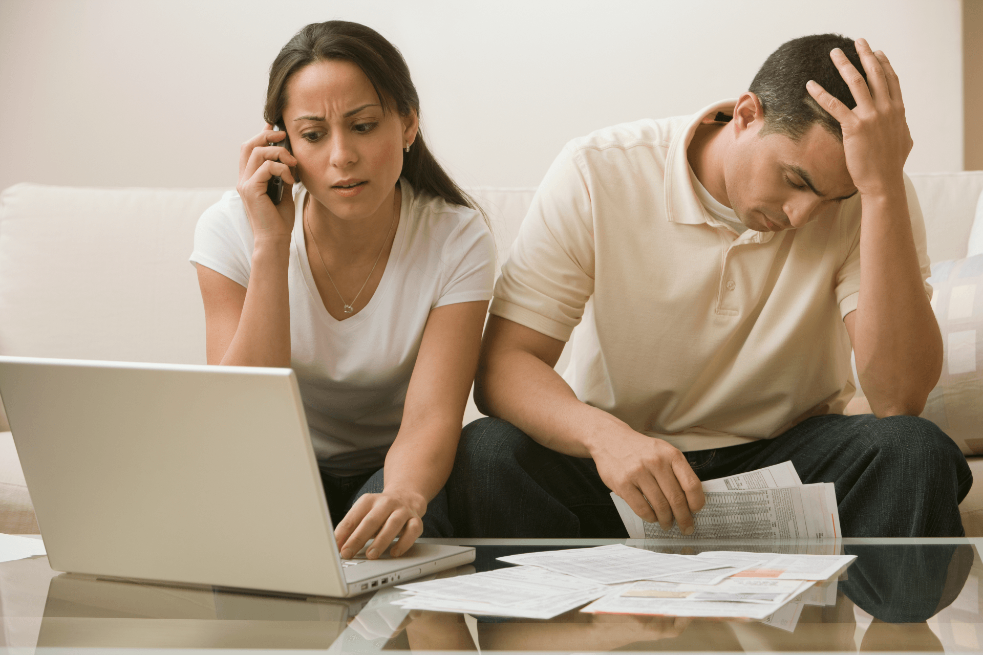 Husband and Wife Checking Bills — West Palm Beach, FL — Ozment Law