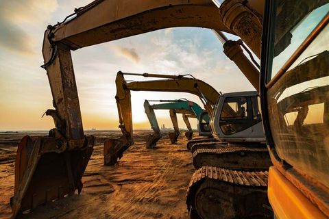 Excavators in Line — Earthmoving Services  in Benaraby, QLD