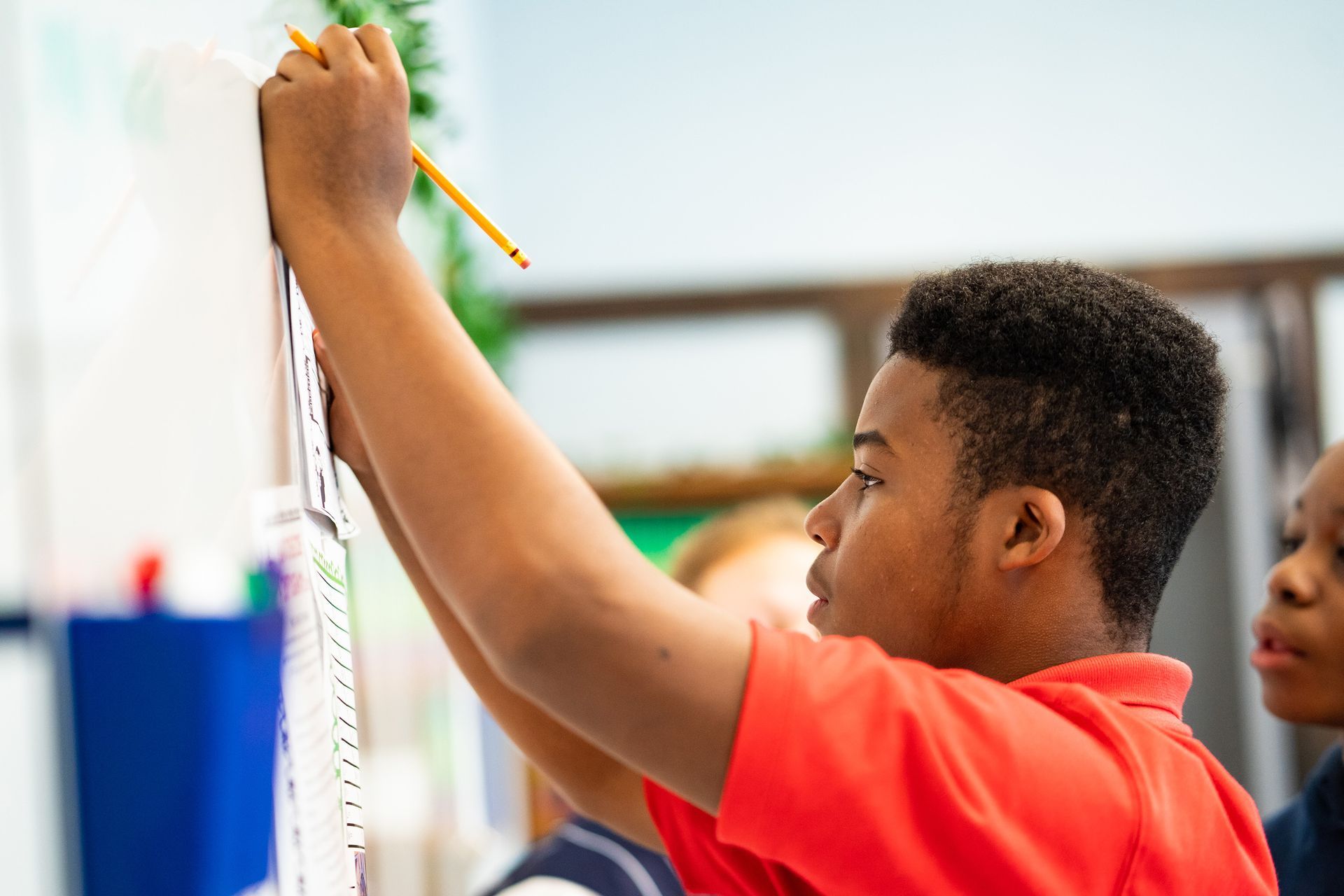 Chattanooga Charter School of Excellence image of student at the board