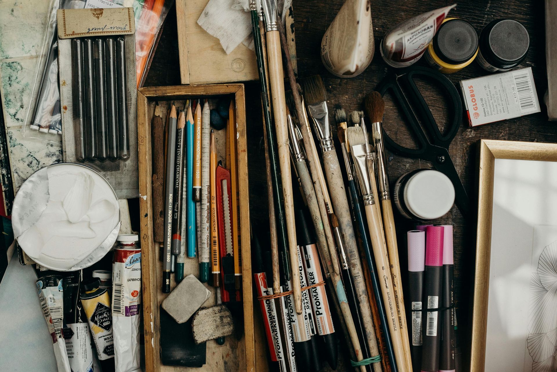 Creative tools laid out to symbolize flexibility and custom strategy work.