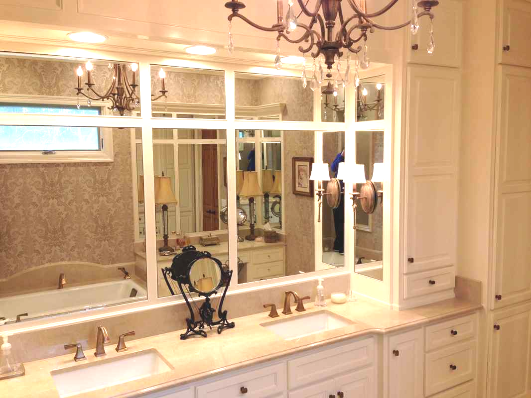 Cabinet Doors — Mirror Reflecting The Chandelier in Jackson,MS