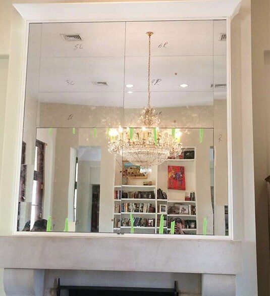 Residential Glass — Mirror Reflecting The Chandelier in Jackson,MS