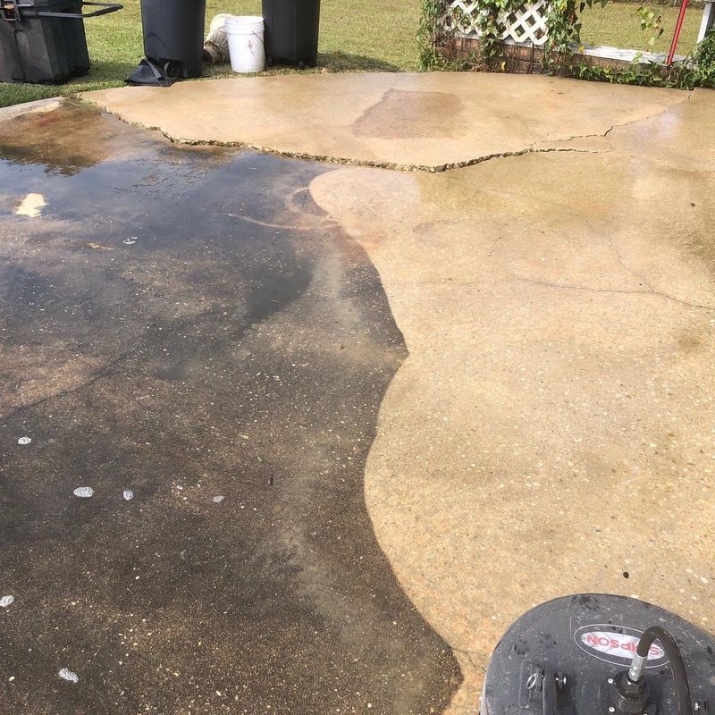 A concrete patio with a vacuum cleaner on it.
