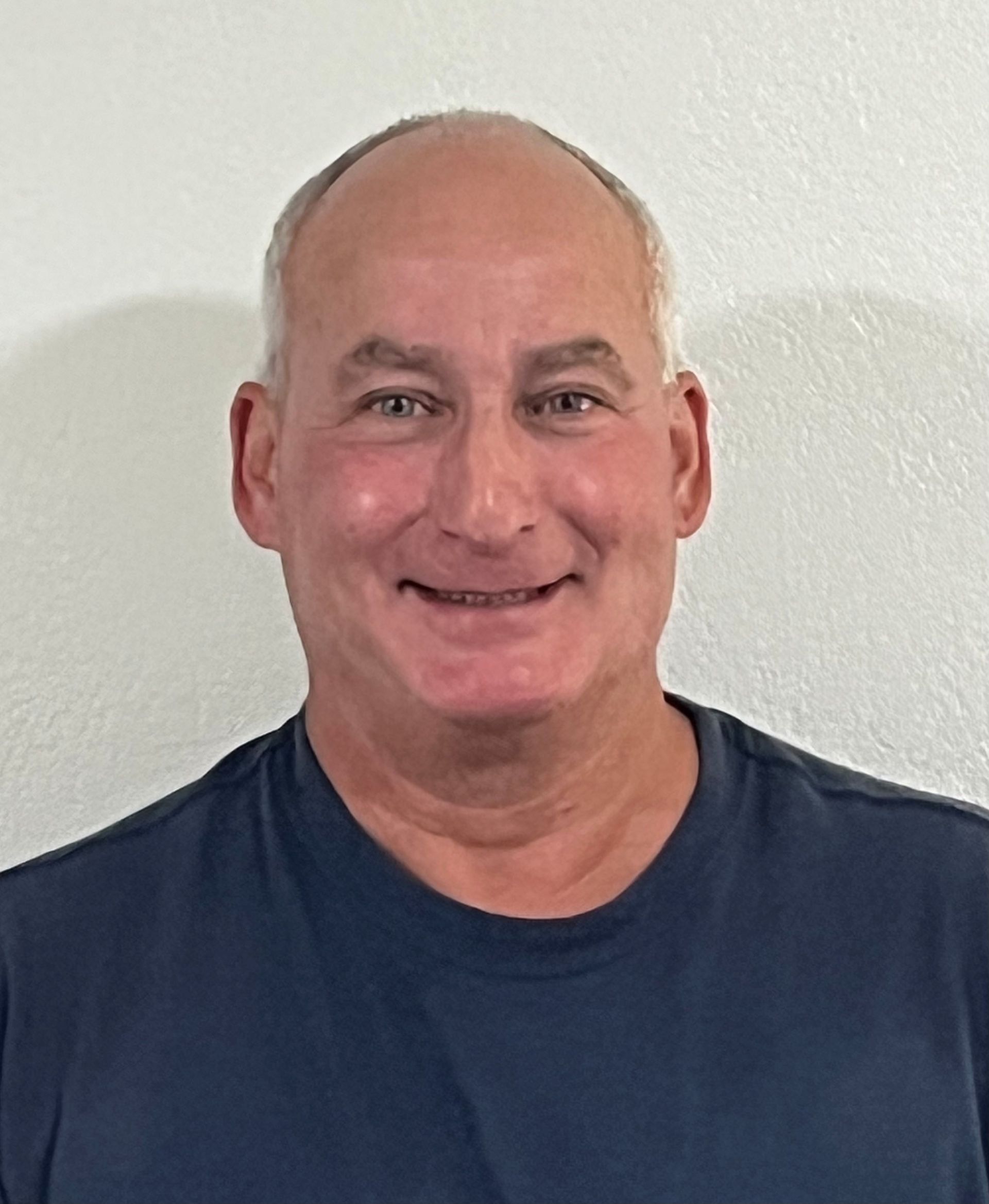 A man smiling for the camera.