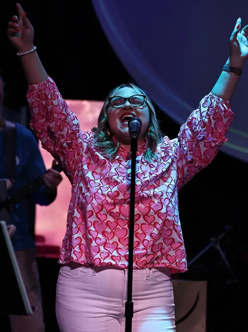 A black and white photo of a piano keyboard.