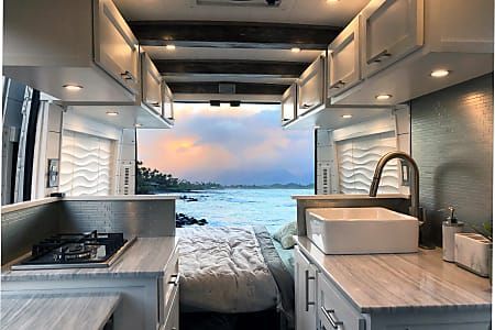 wood deck with landscaping in backyard of home