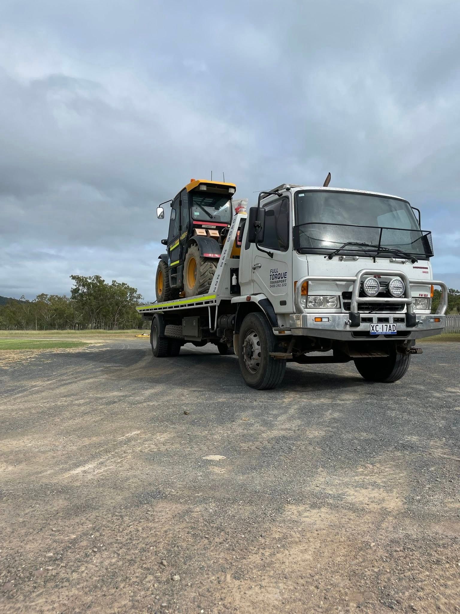 Red Semi-truck With Trailer on Side of Road, Sunny Sky — Full Torque Transport In Parkhurst, QLD 