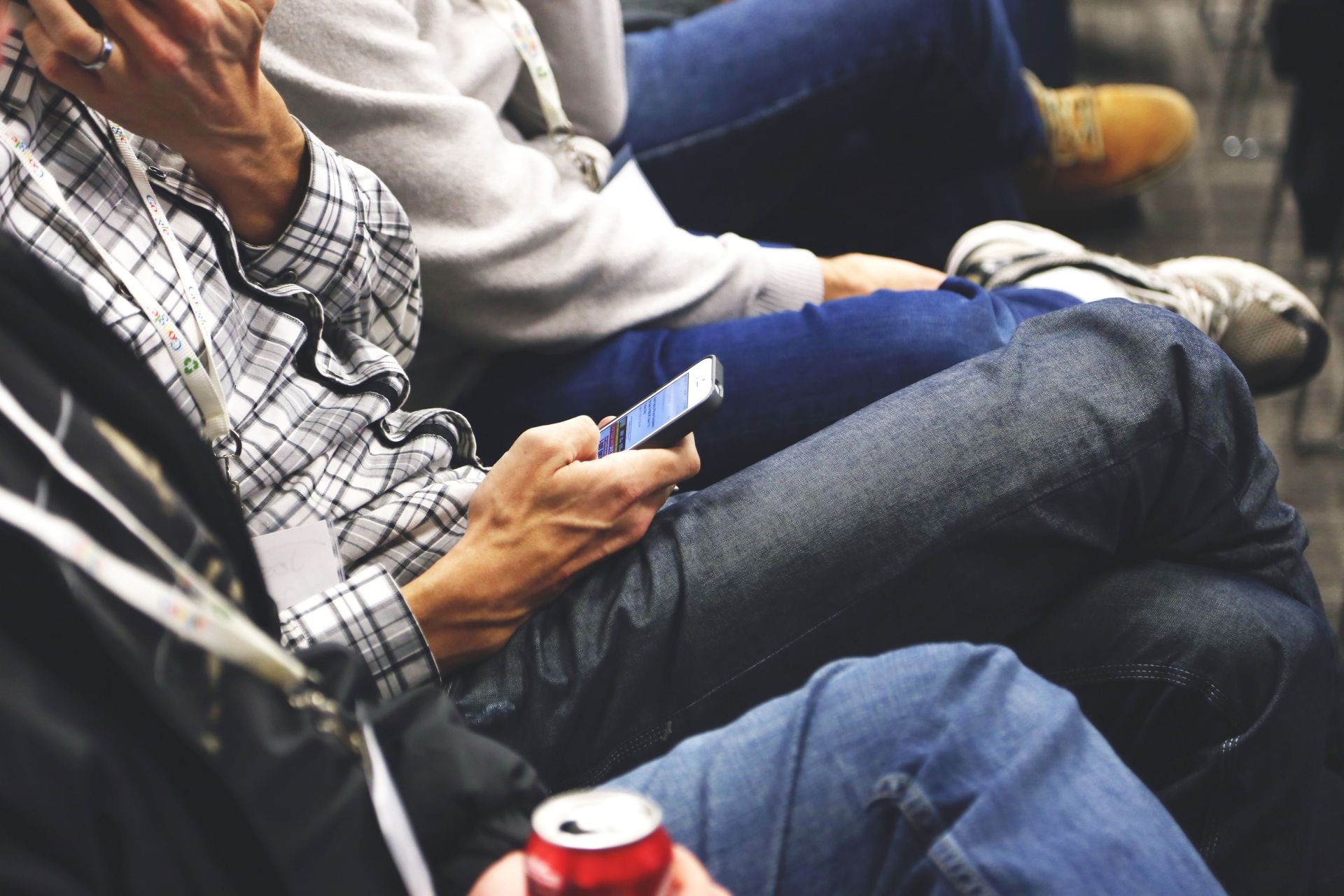 A tourism professional using the VoyaPress platform on a cellphone