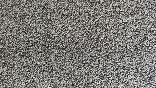 A close up of a gray carpet texture.