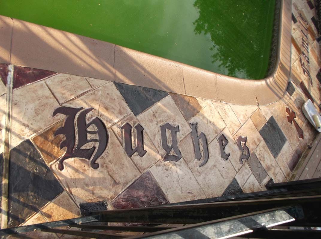 The name hughes is on the side of a vehicle