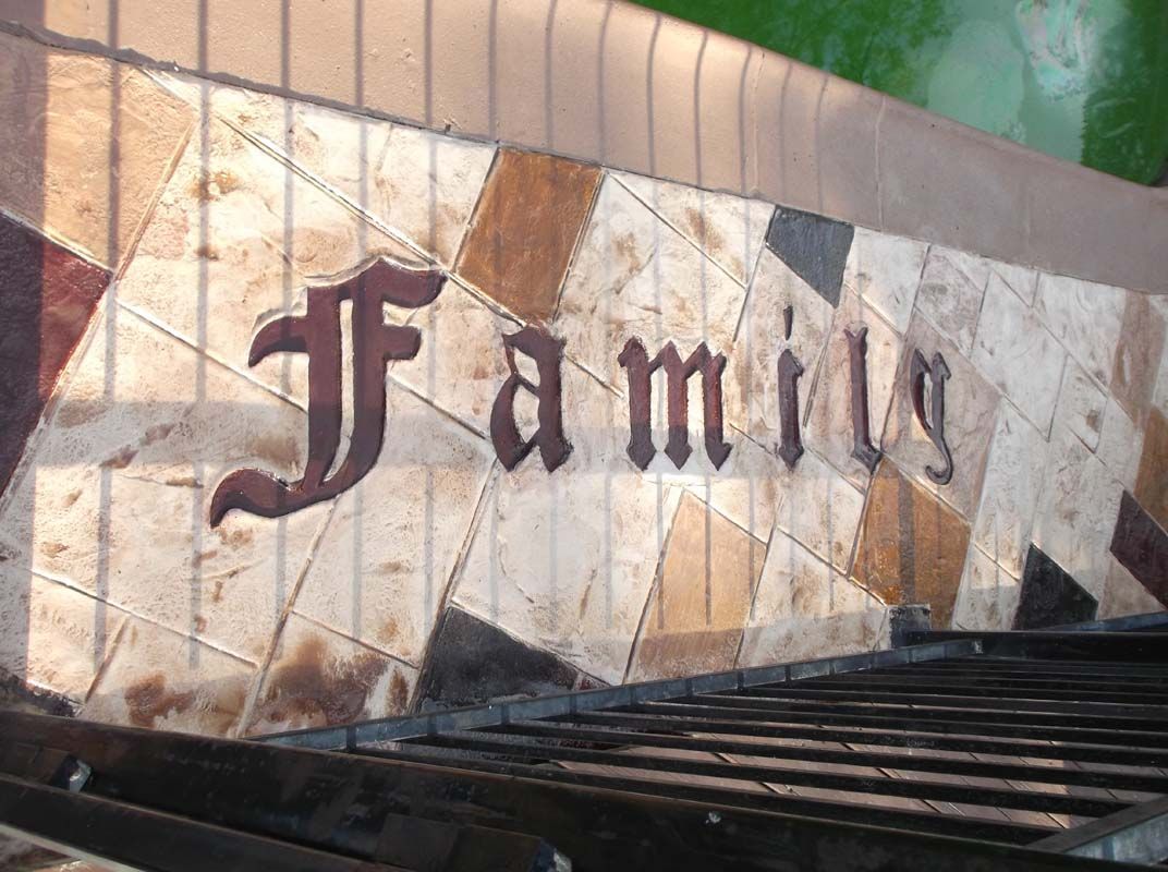 A sign with the word family written on it