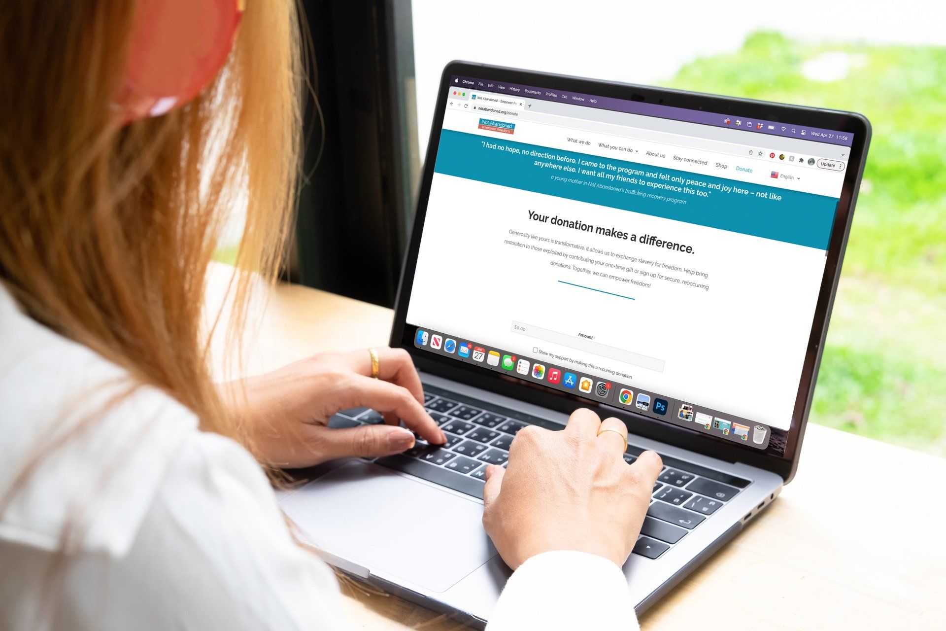 woman typing on a laptop