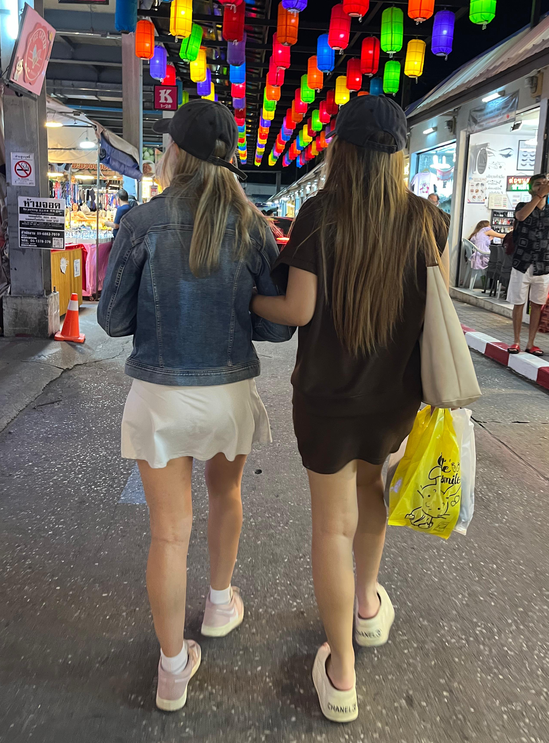 Volunteer and Student walking together