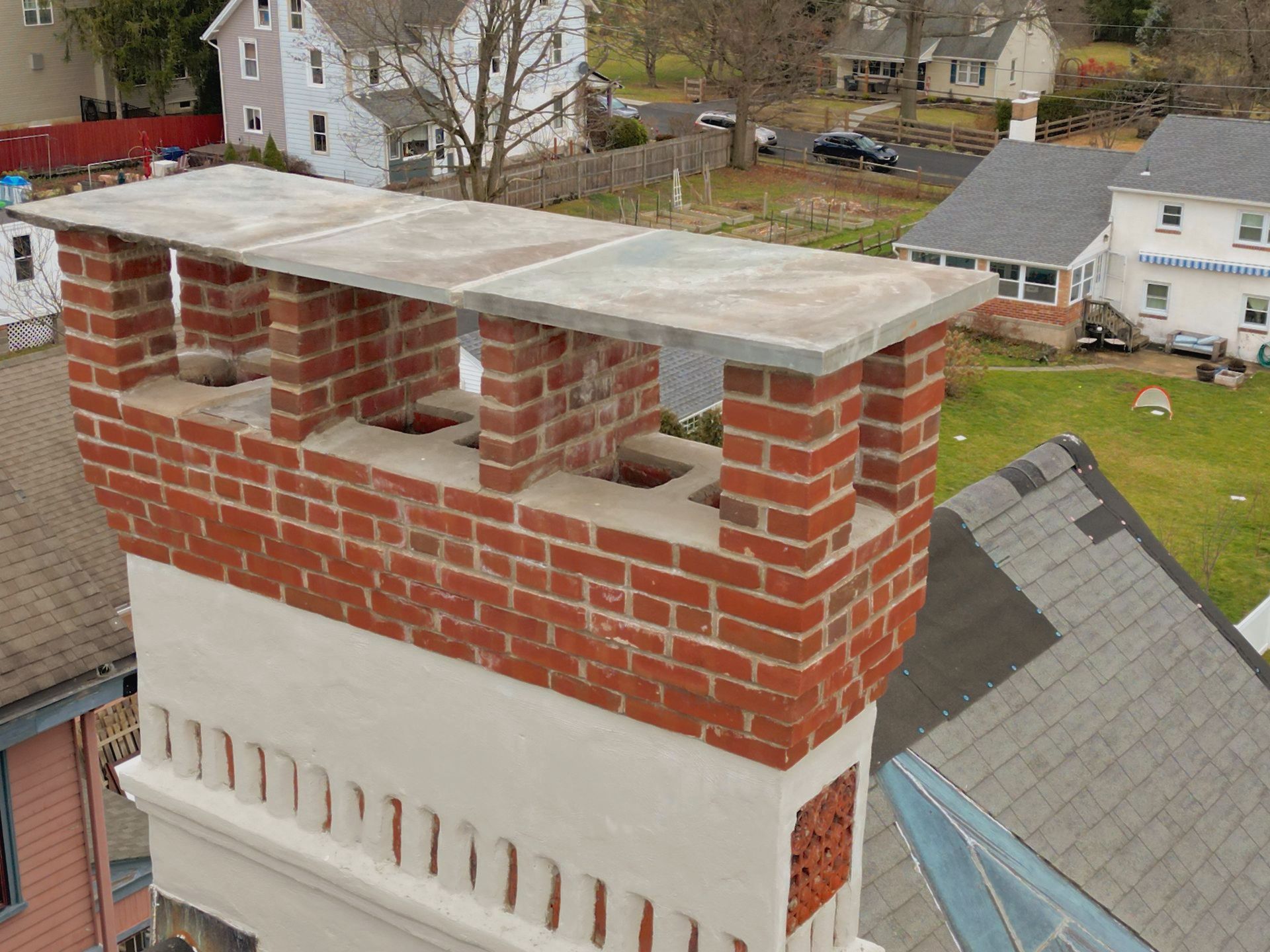 red brick chimney after repairing