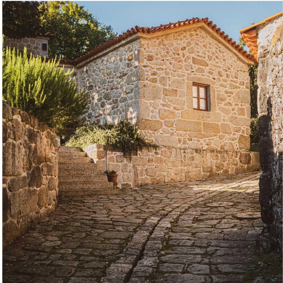 Old Stone Street with a Stone Building and sunlight