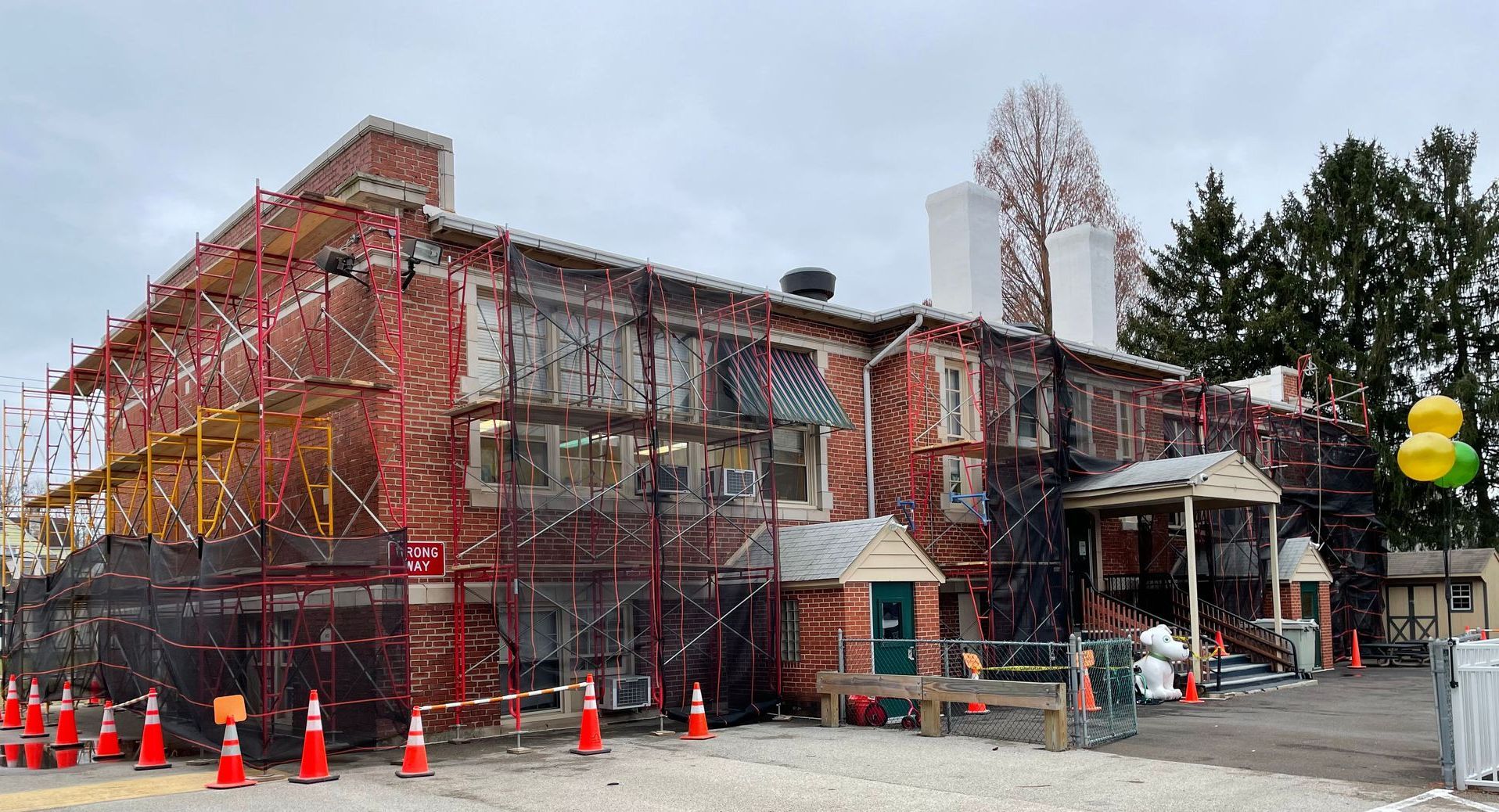 Stone Chimney Veneer and Chimney Crown Installation - Montgomery County - Disciple Masonry