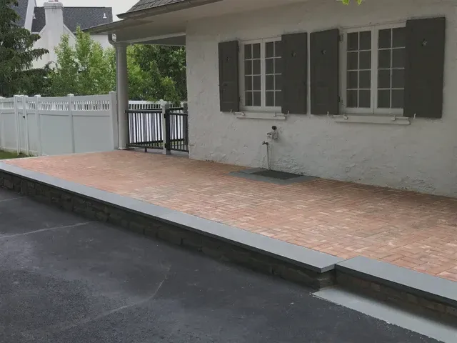 Brick Patio Relay with Bluestone Border — Chestnut Hill, PA — Disciple Masonry