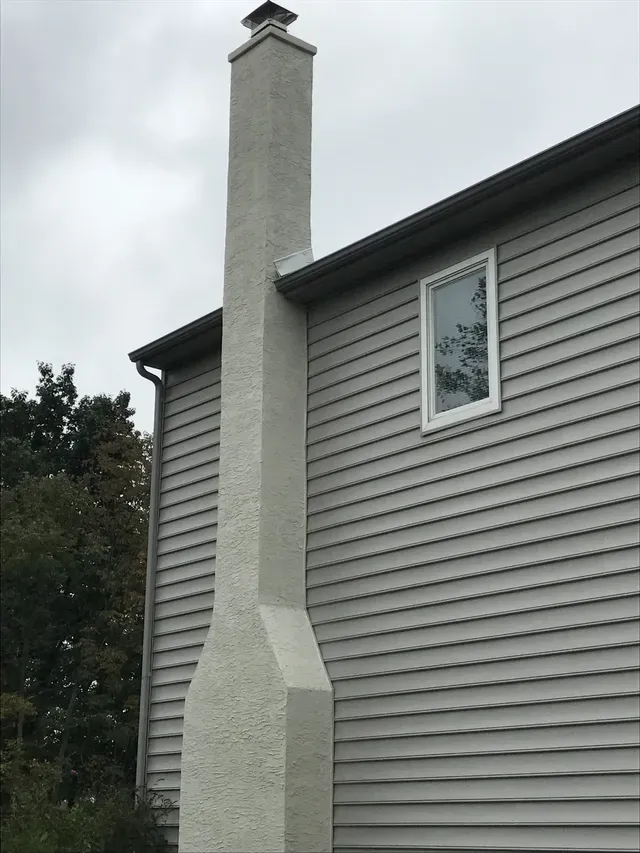 Stucco Chimney Exterior Wall Finish — Fort Washington, PA — Disciple Masonry