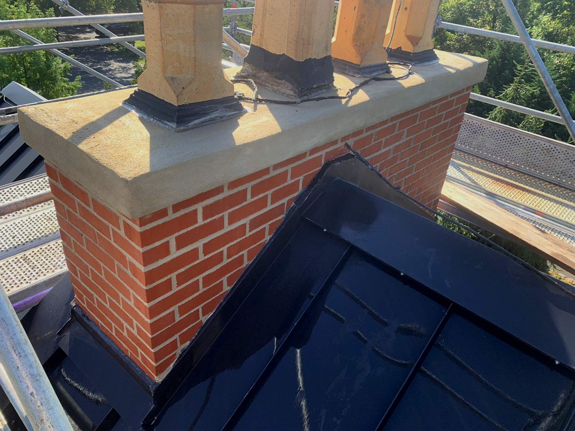 Brick Chimney Rebuild with Concrete Coping and Terracotta Flue - Langhorne, PA - Disciple Masonry