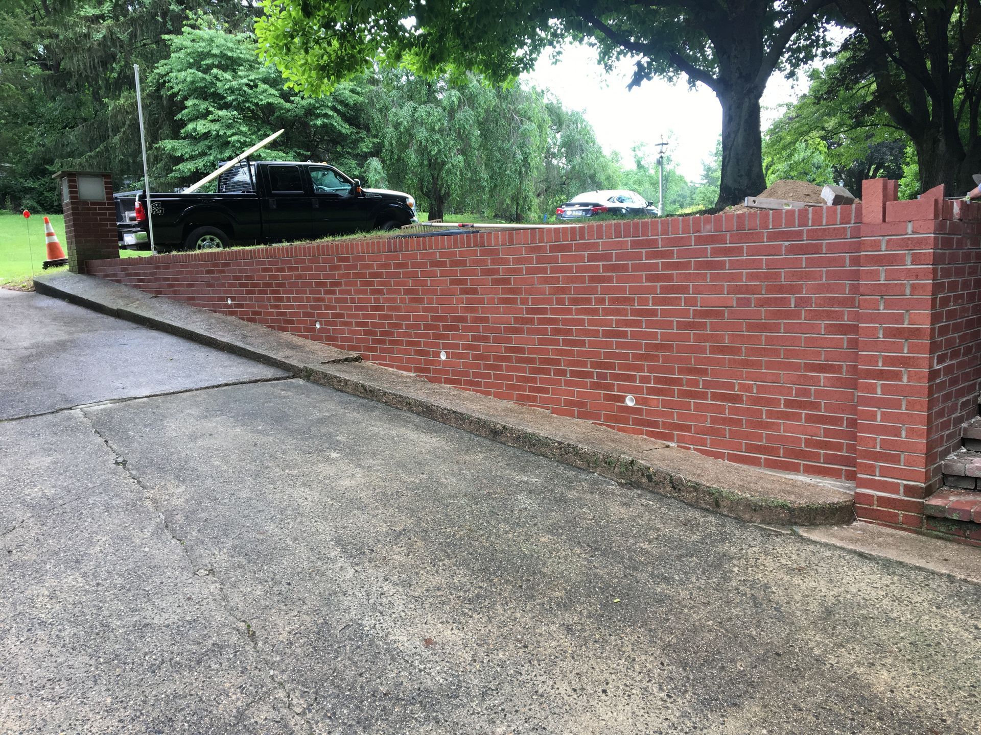 Brick Retaining Wall Rebuild with Weep Holes - Disciple Masonry - Montgomery County, PA