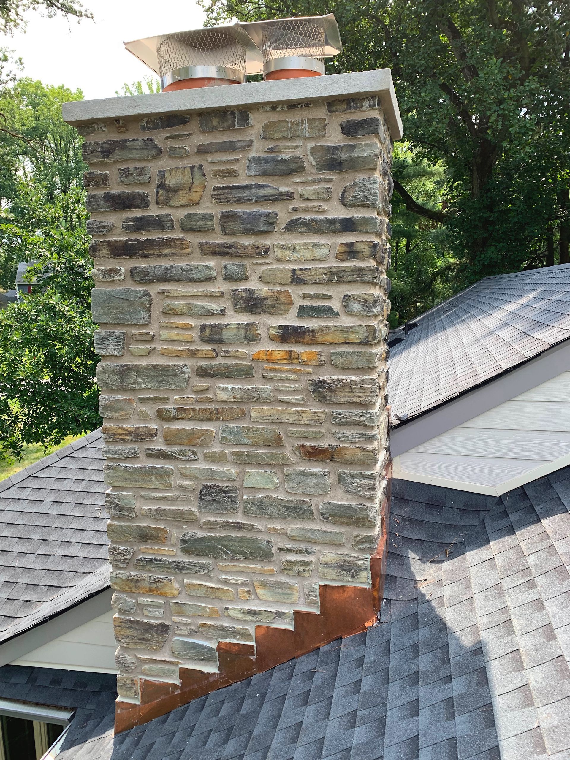 Restored Stone Chimney with Concrete Coping and New Cap- Montgomery County, PA - Disciple Masonry
