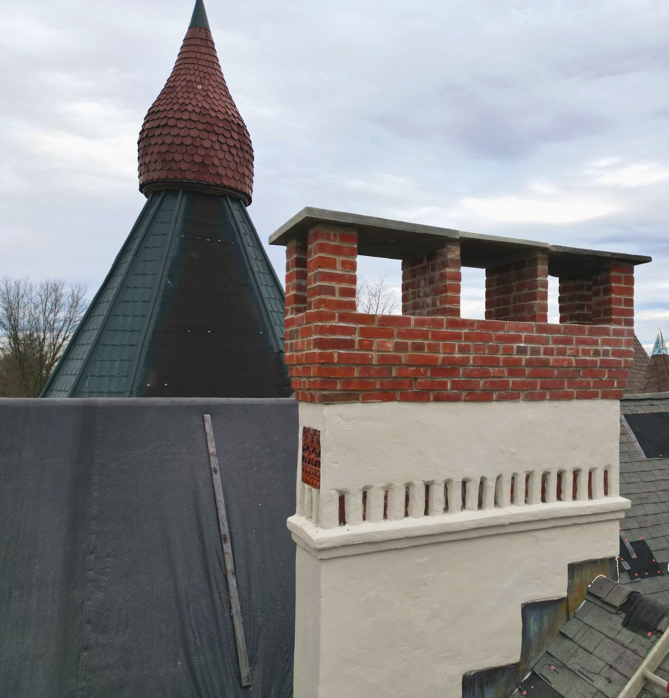 Brick Chimney Repair with new crown and stone cap  - Fort Washington, PA -  Disciple Masonry