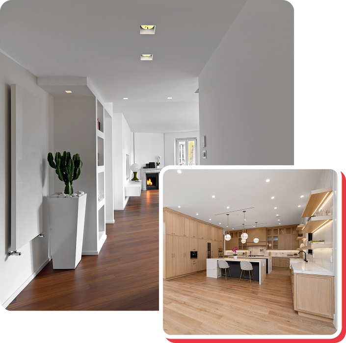 Hallway with potted cactus, hardwood floor, and recessed lighting. Kitchen with island and wood cabinets.