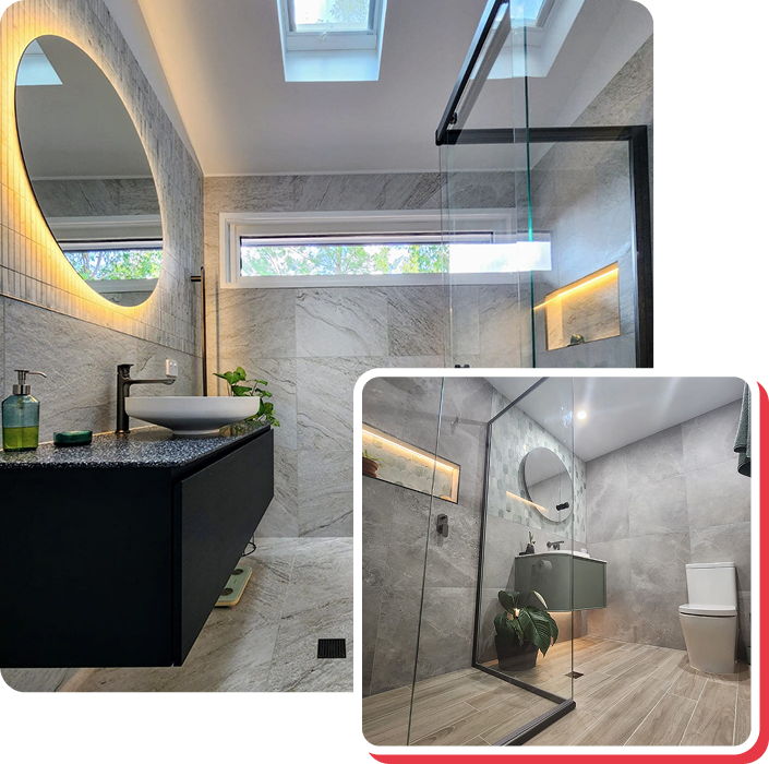 A kitchen with pendant lights and an electrician working on wiring on the wall.