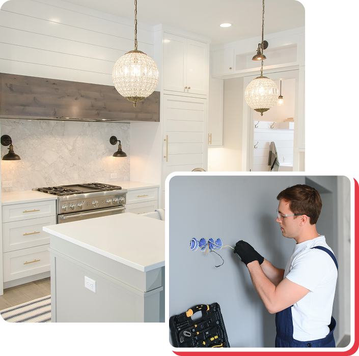 A kitchen with pendant lights and an electrician working on wiring on the wall.