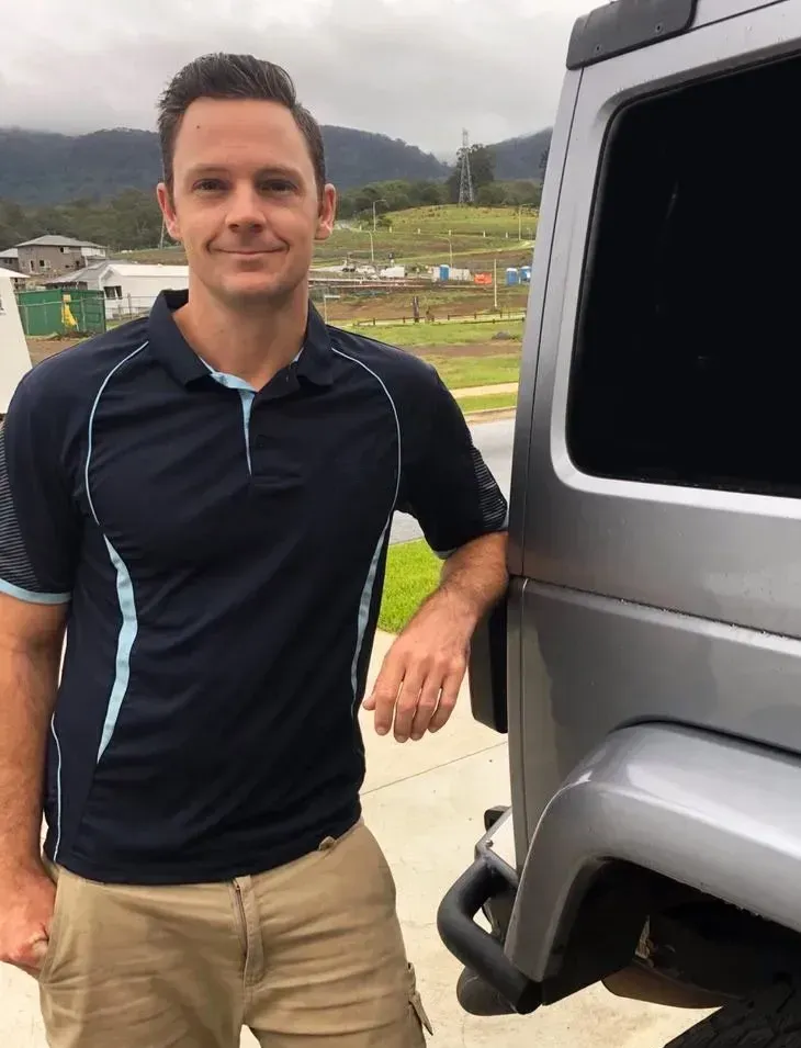 Man Standing next to Work Van — Proshield Insulation & Waterproofing In Shell Cove, NSW
