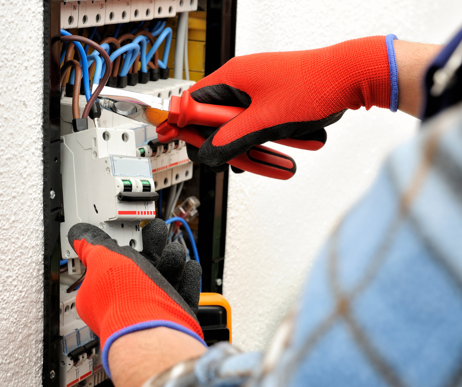 A bunch of pipes are connected to each other on a wall.