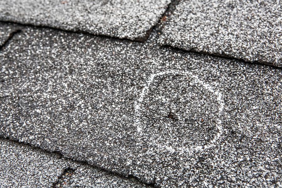 Hail damage on shingle roof