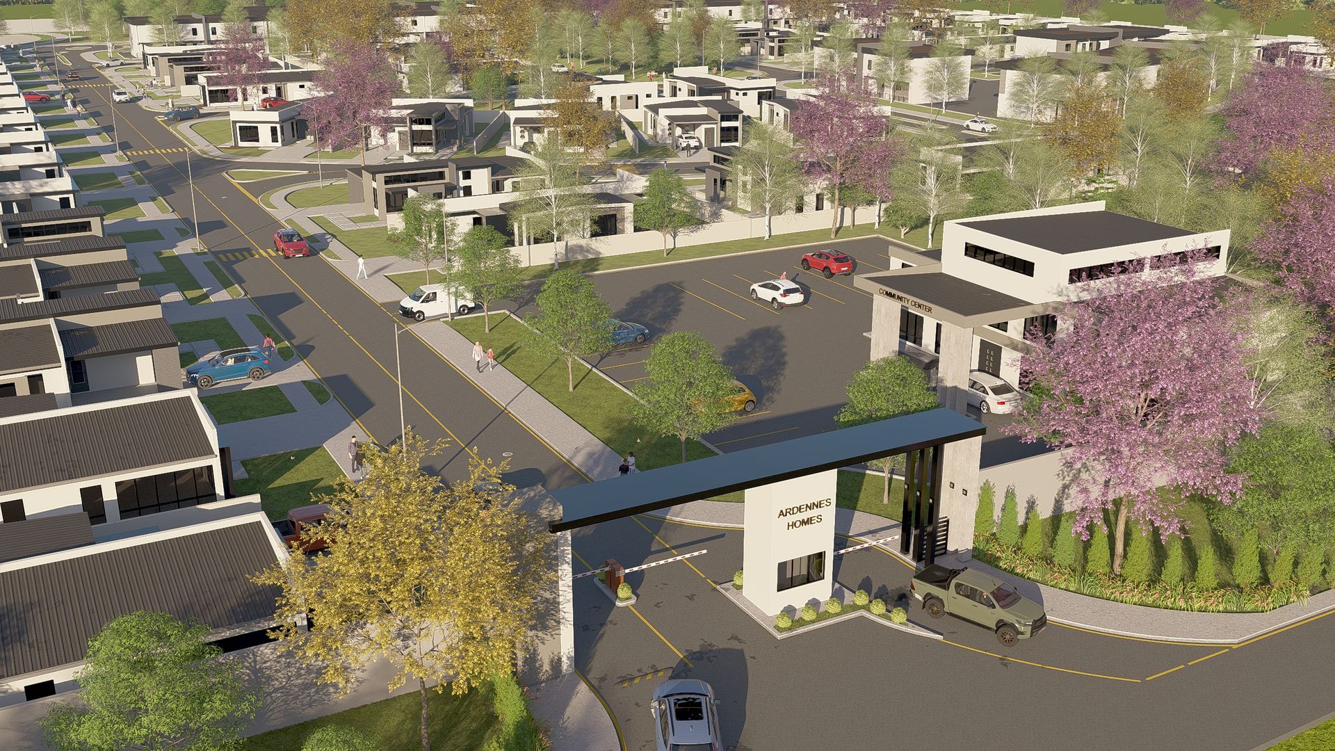 Aerial view of gated community entry with cars, modern homes, and flowering trees.