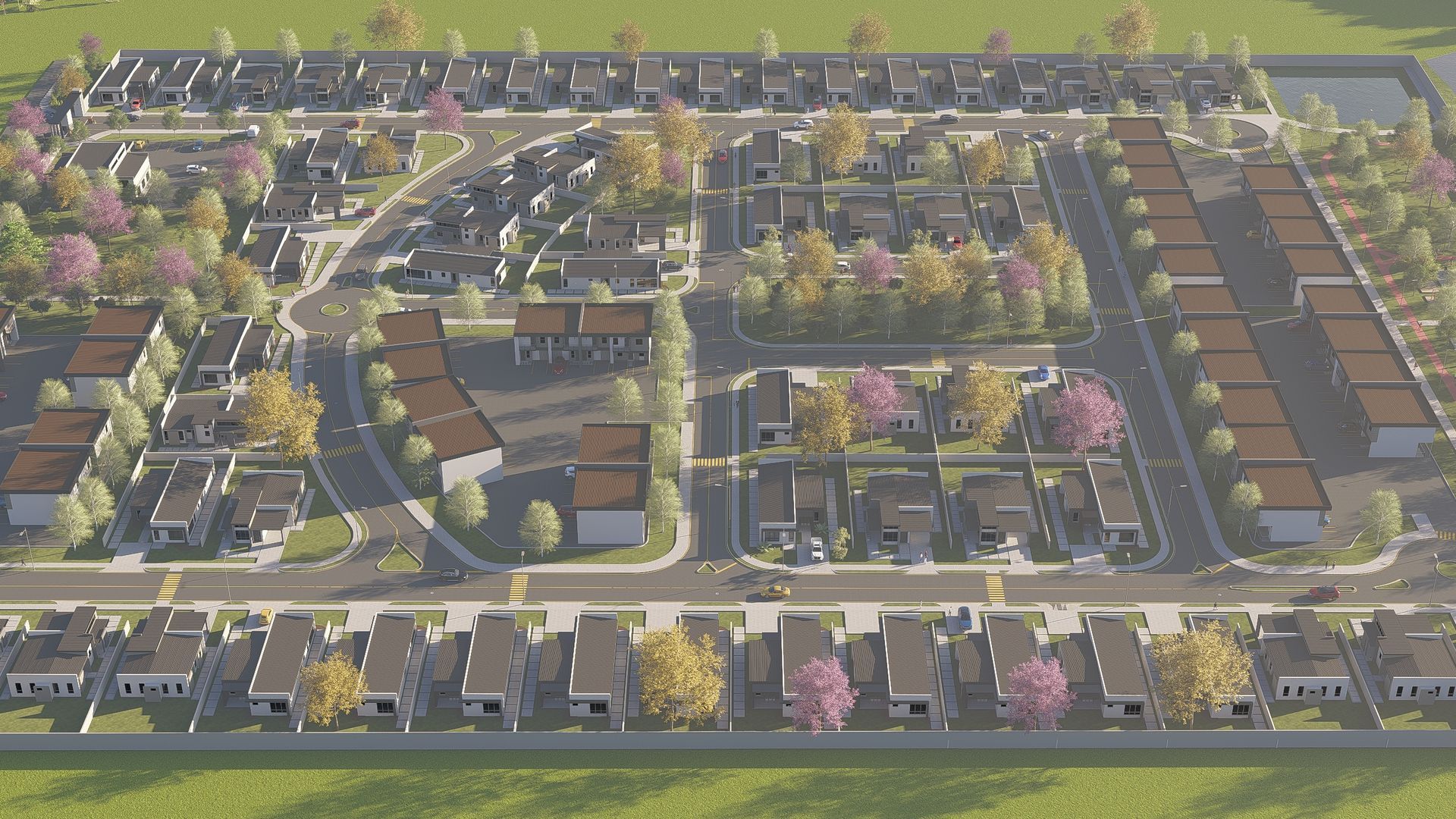 Aerial view of a suburban neighborhood with rows of houses, roads, and trees, bathed in sunlight.
