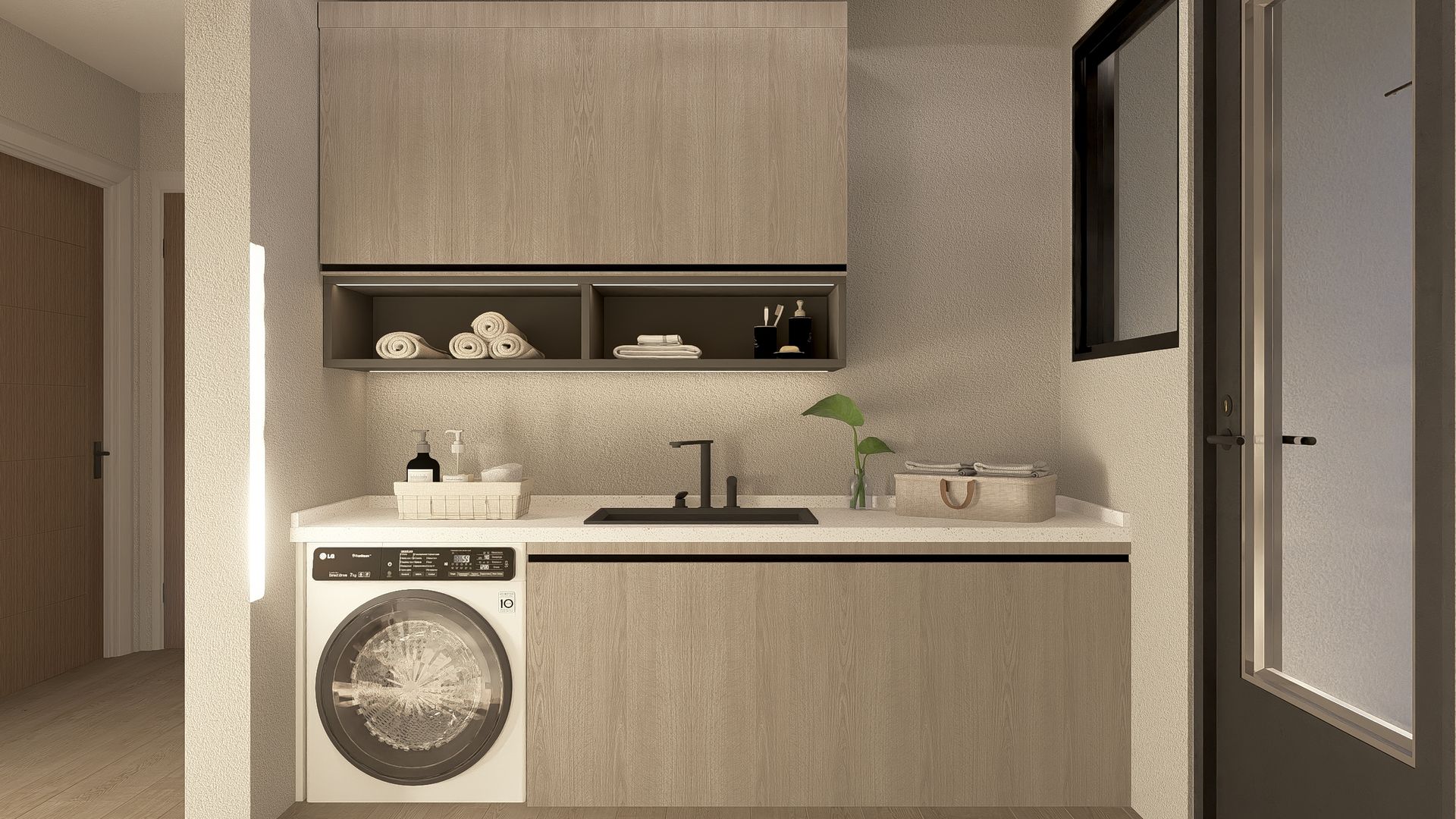 Laundry room with a washing machine, sink, and cabinets in a neutral color palette.