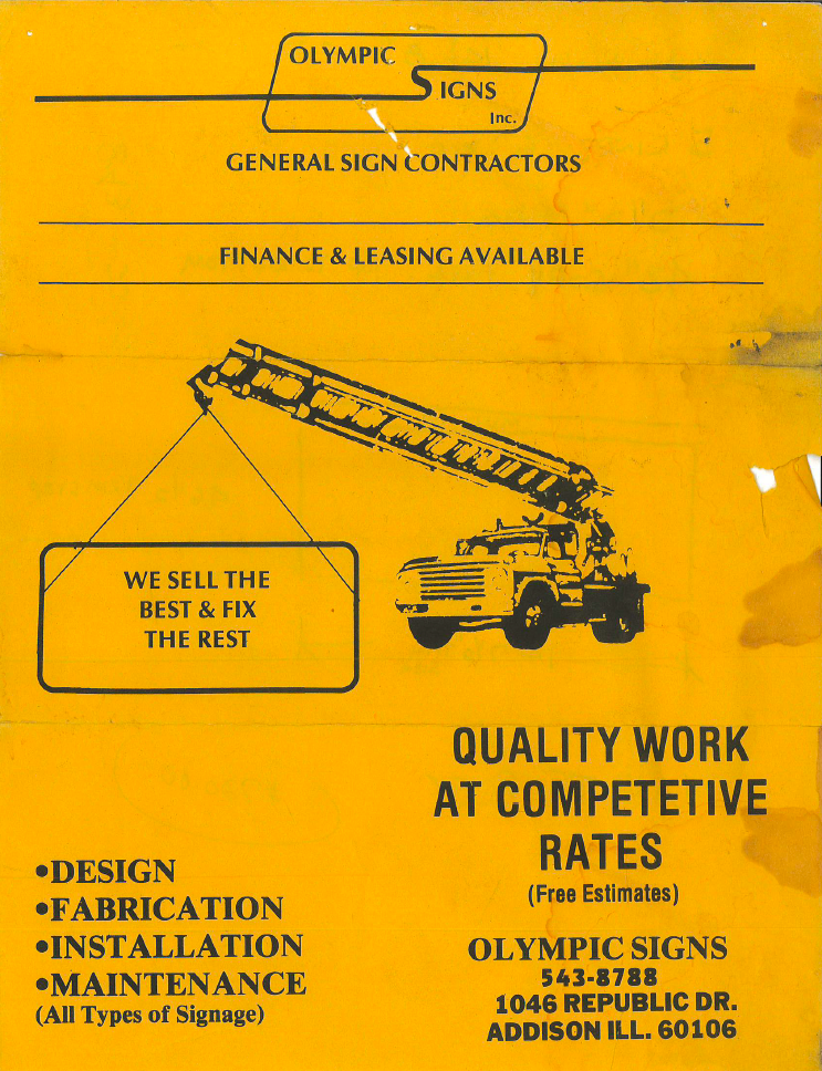Yellow sign for Olympic Signs featuring a crane, text indicating general sign contractors and their services.