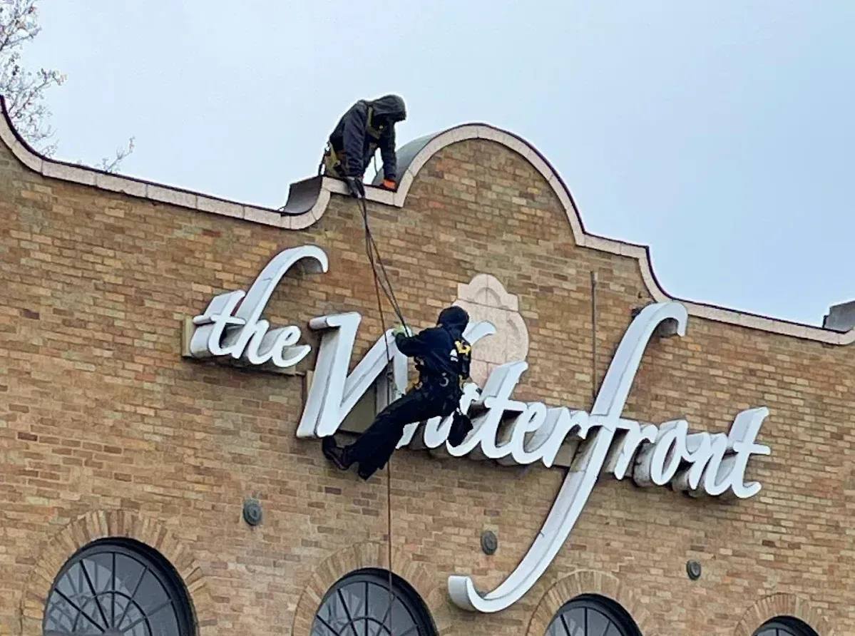 Two people on the roof of