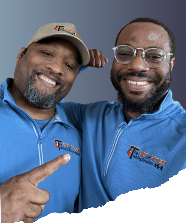 Two men are posing for a picture and one is pointing at the camera