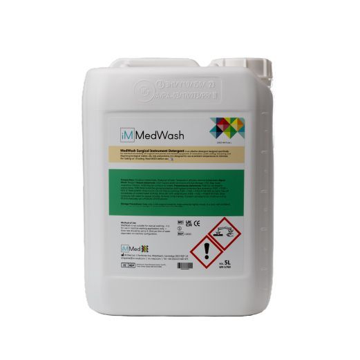 Bottle of iM Med's iM MedWash alkaline detergent for mechanical washing of surgical instruments.