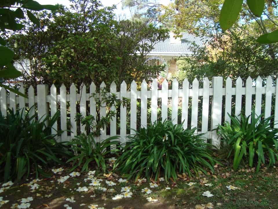 white wooden fence