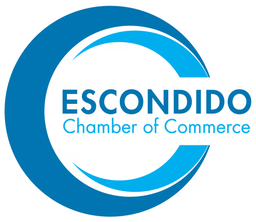 A blue and white logo for escondido chamber of commerce
